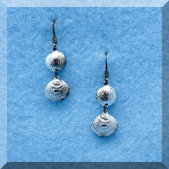 J17. Sterling silver seashell earrings - $14